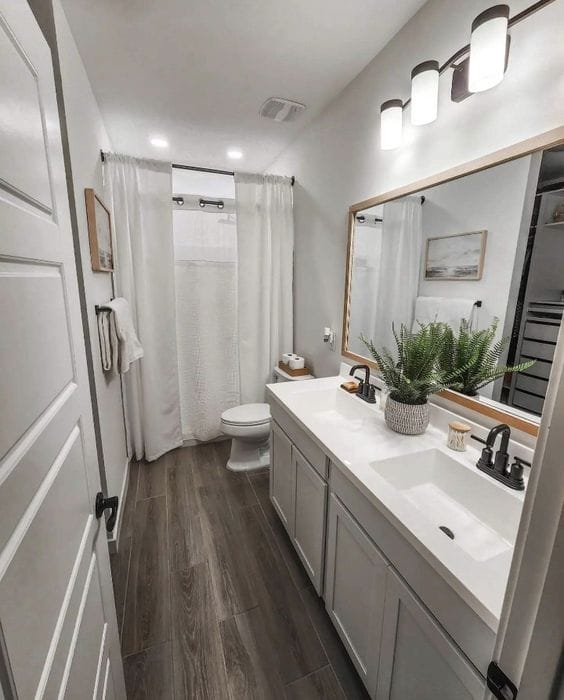 Spotless double-vanity bathroom after professional cleaning in Niagara Falls